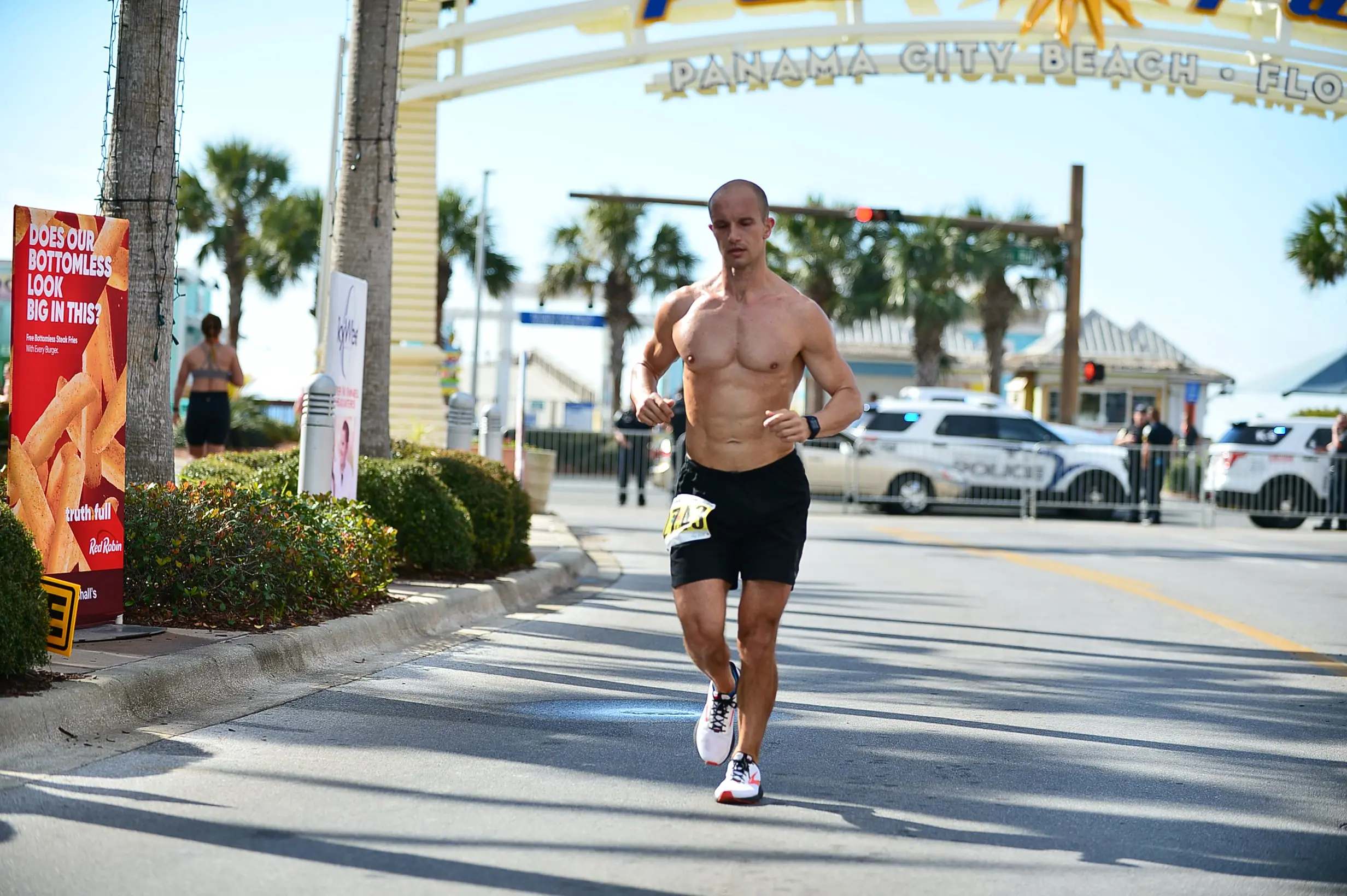 Dr. Marc Lewis running a race in Panama City Beach, Florida
