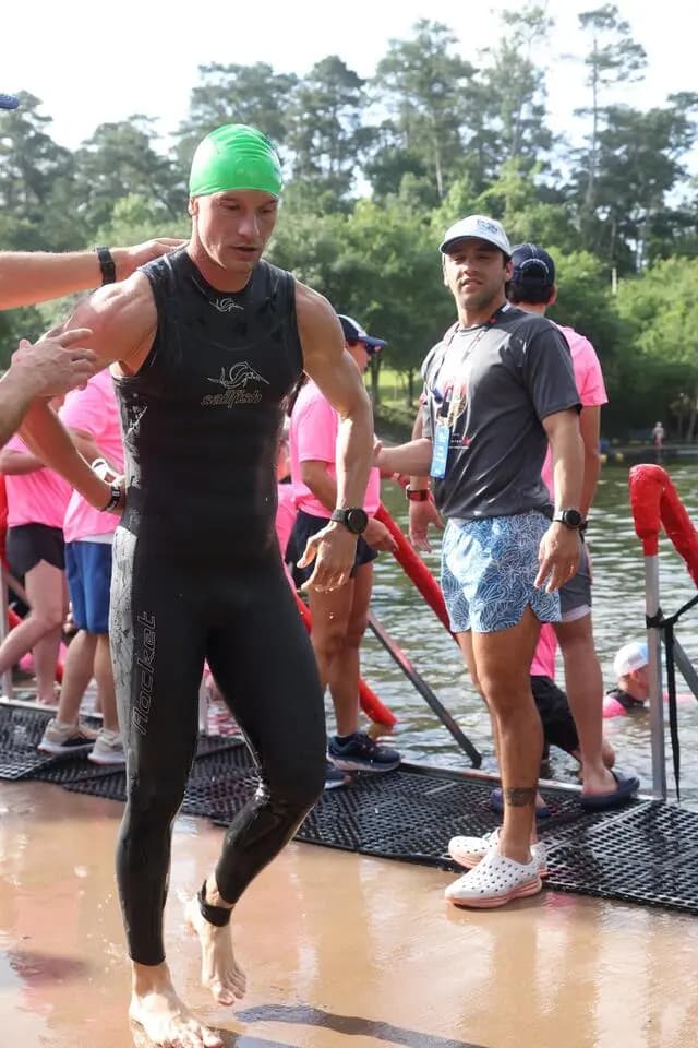 Dr. Marc Lewis exiting the water after an open-water swim