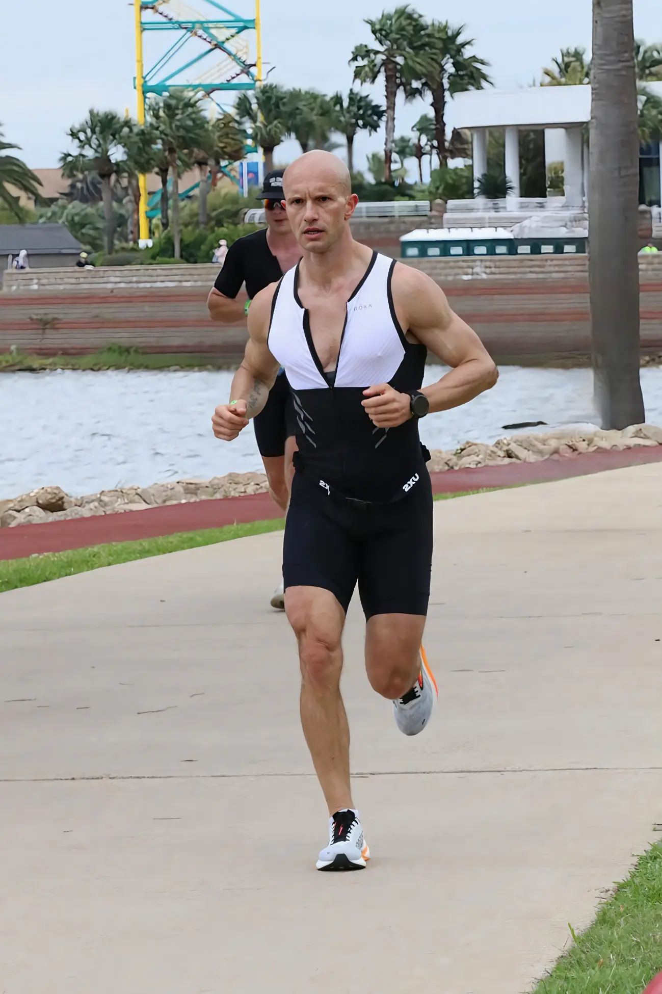 Dr. Marc Lewis running a triathlon