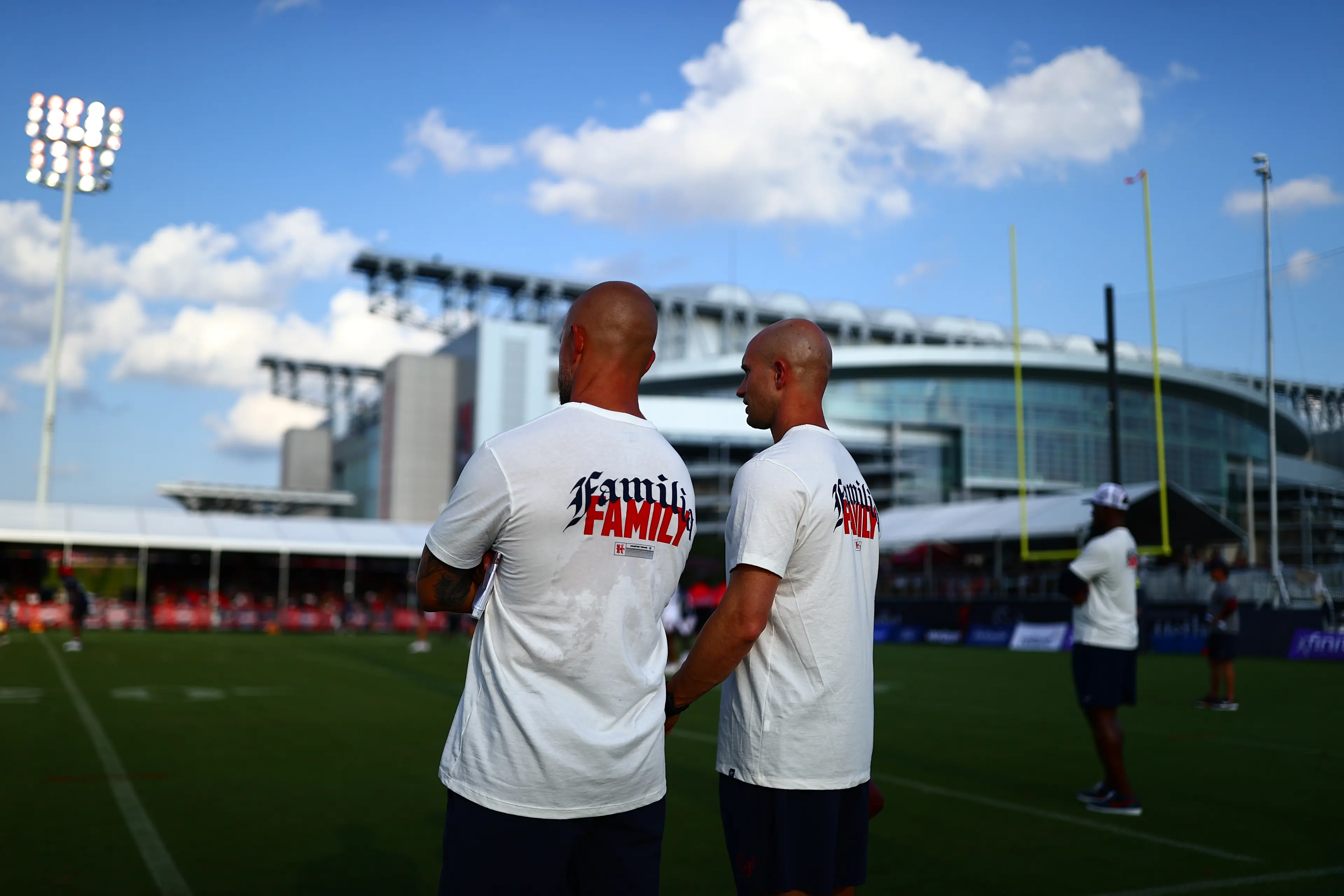 Marc Lewis and a colleague on the field at NRG Stadium